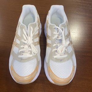 ASICS - woman’s gold and white sneakers